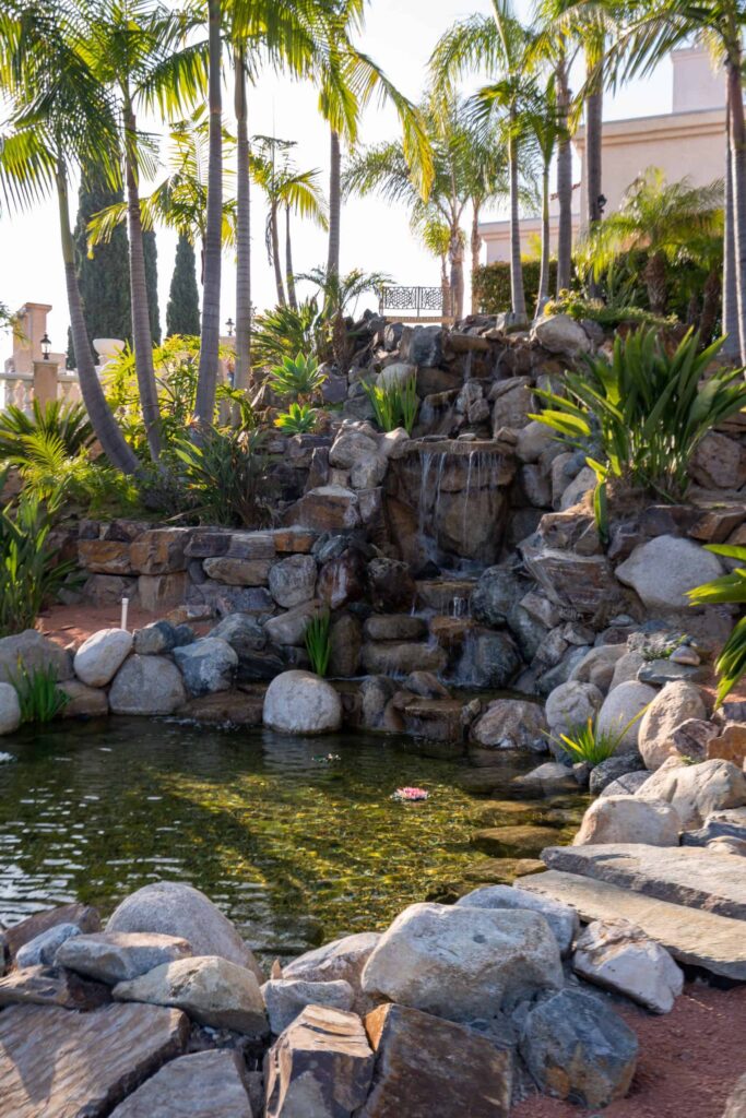 A waterfall and rock garden among the meditation gardens at Villa Oasis