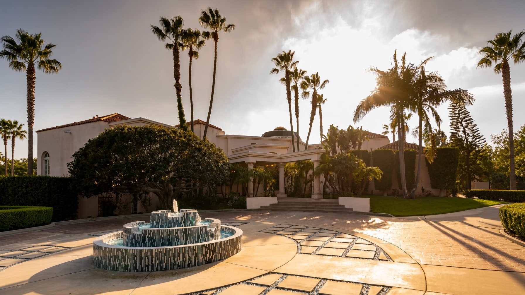 The entry to the Villa Oasis estate in Rancho Santa Fe at golden hour